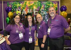 Mardi Gras and smiles at the booth of Dave’s Specialty Imports. Alma Lorenzo, Leslie Simmons, Alex Molina and Mike Bowe.